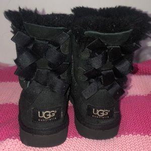 Black UGGS boots with bows on back